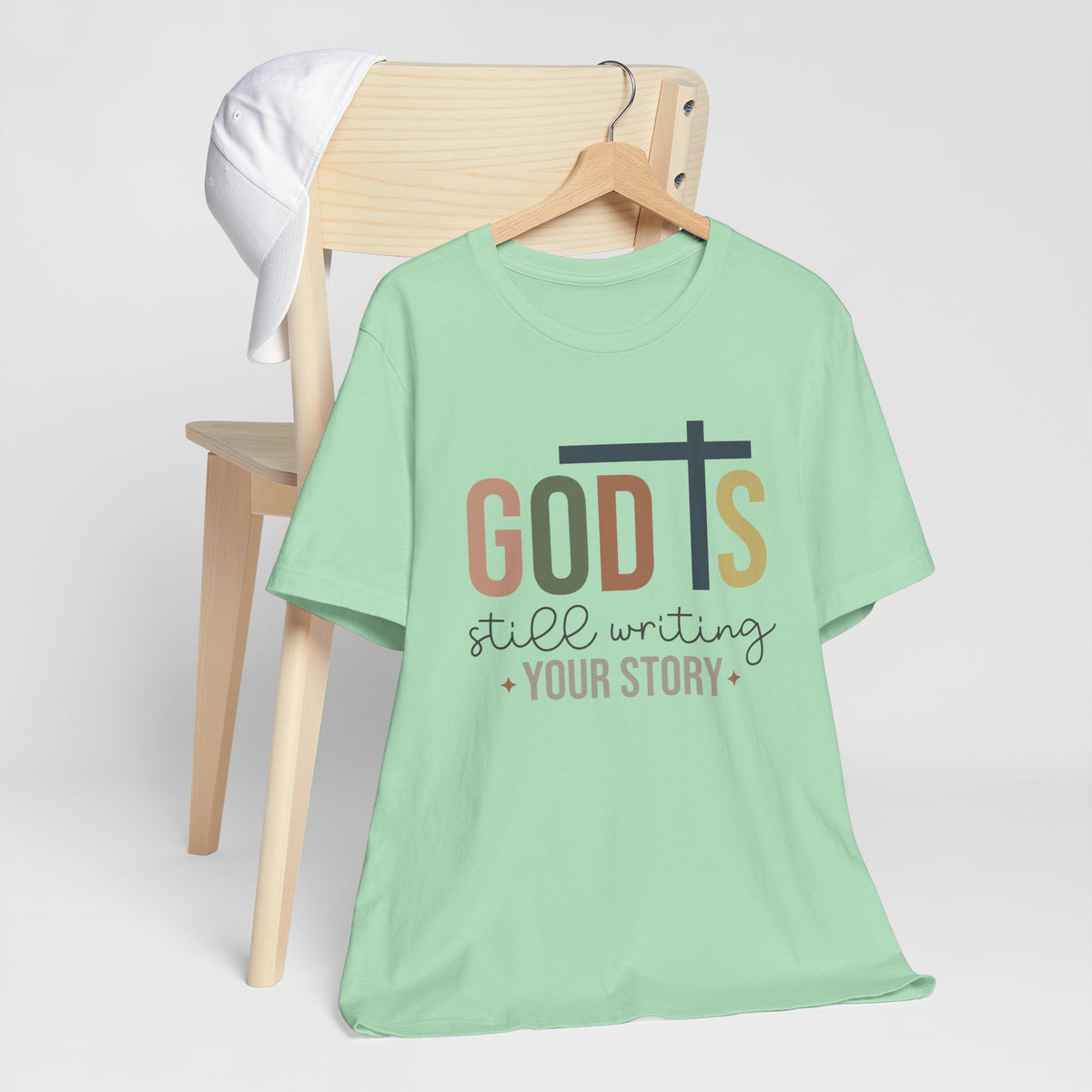 God Is Still Writing Unisex T-Shirt